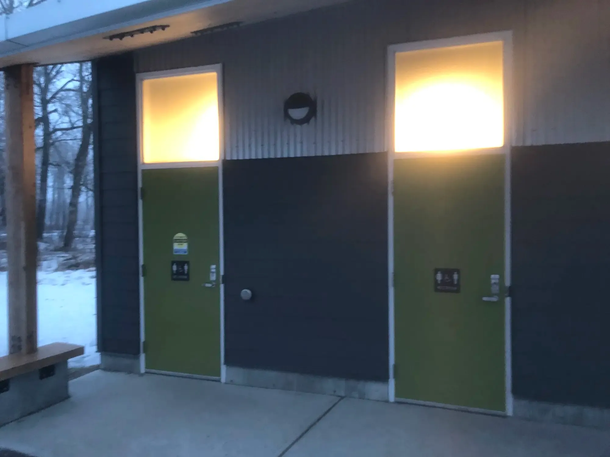 Dark vertical siding on a completed building exterior